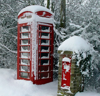Phone box and Post box in snow